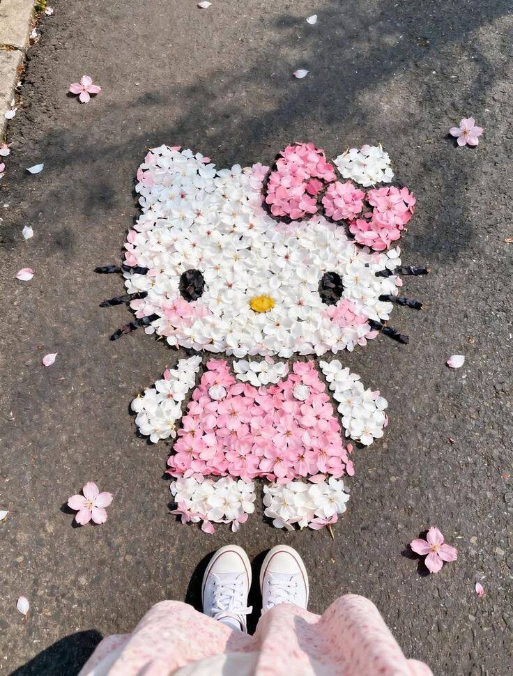 Foto de perfil de la linda Hello Kitty con flores de colores