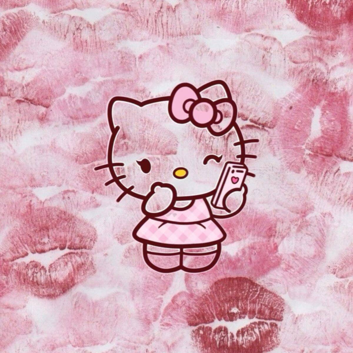 Foto de perfil de la divertida Hello Kitty con teléfono y lazo rosa