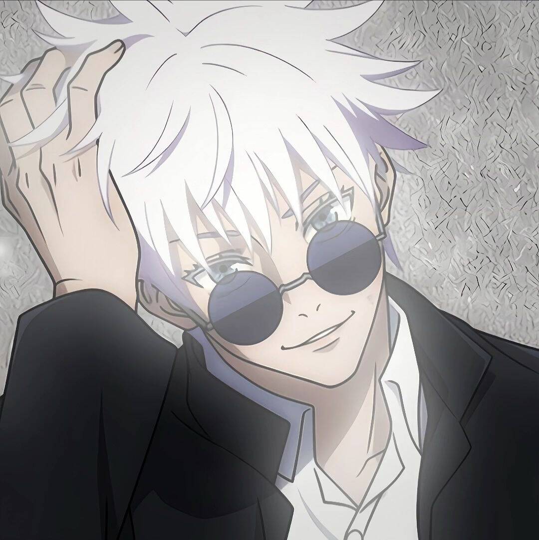 Photo de profil de Satoru Gojo avec des lunettes soleil et un sourire