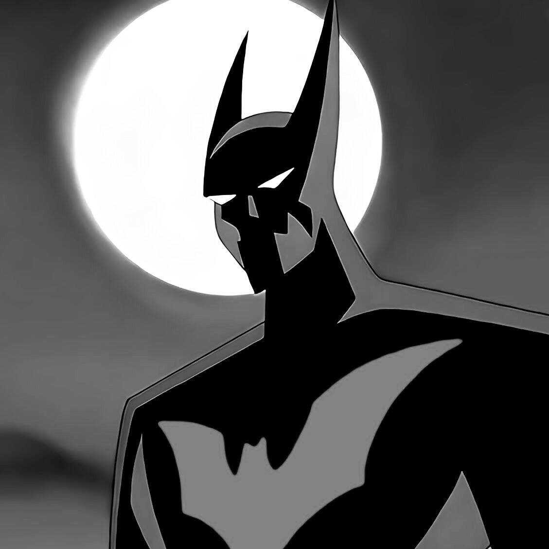 Foto de perfil de Batman con la luna de fondo