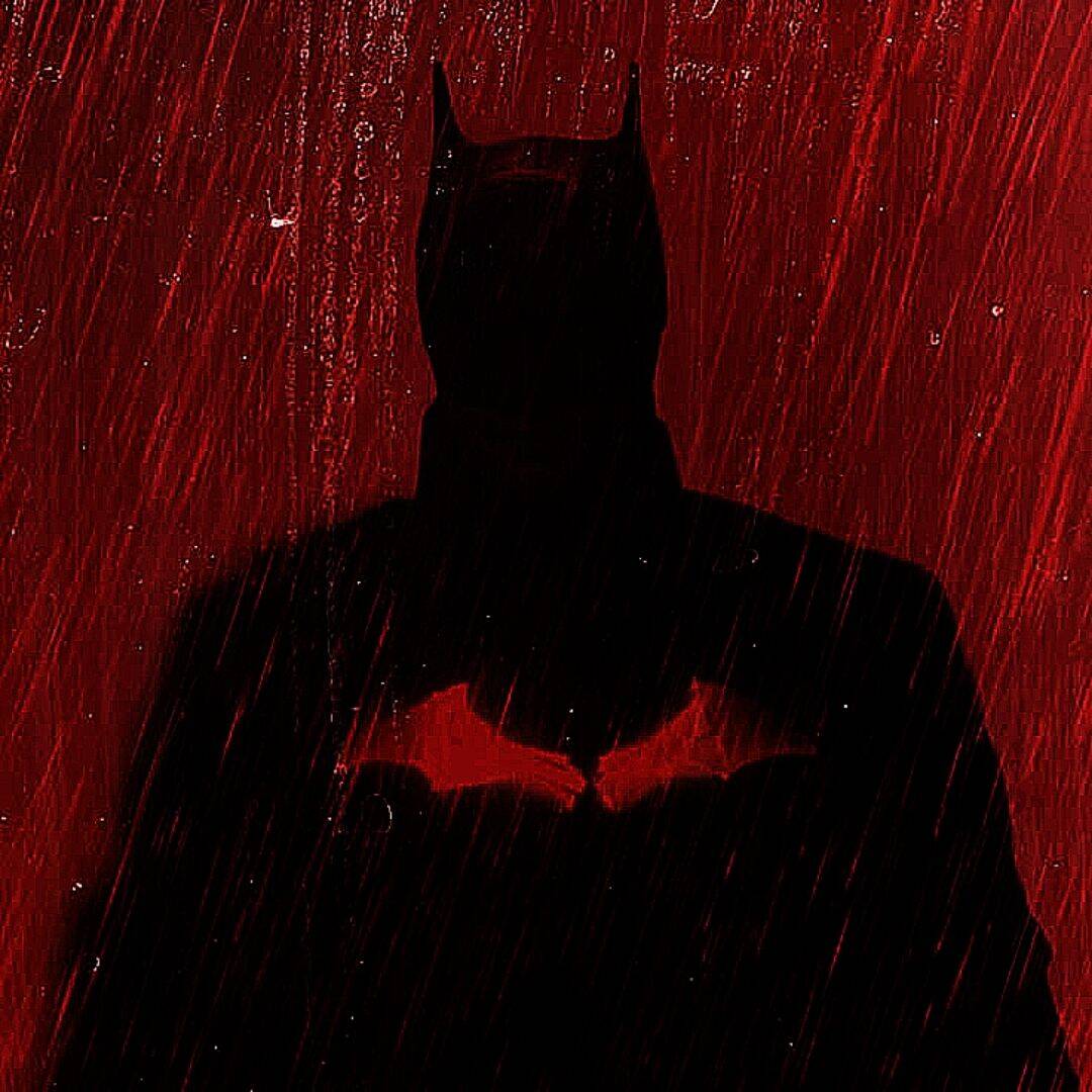 Foto de perfil de Batman con silueta roja.